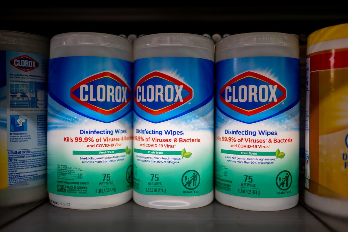 Clorox disinfecting wipes are seen displayed for sale on a store shelf.