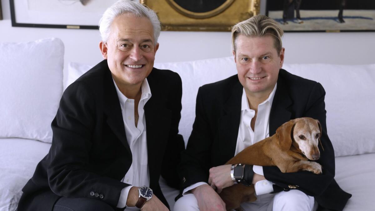 Fashion designers Mark Badgley, left, and James Mischka with one of their dachshunds, Rommel. The couple's fashion brand maintains a glamour element. But if you see something you like on Instagram, just say so.