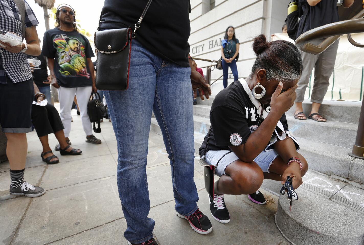 Sheila Hines, aunt of Wakiesha Wilson, who was found dead in her jail cell in March, is in tears after an L.A. Police Commission meeting. Family members have sought more information about her death.