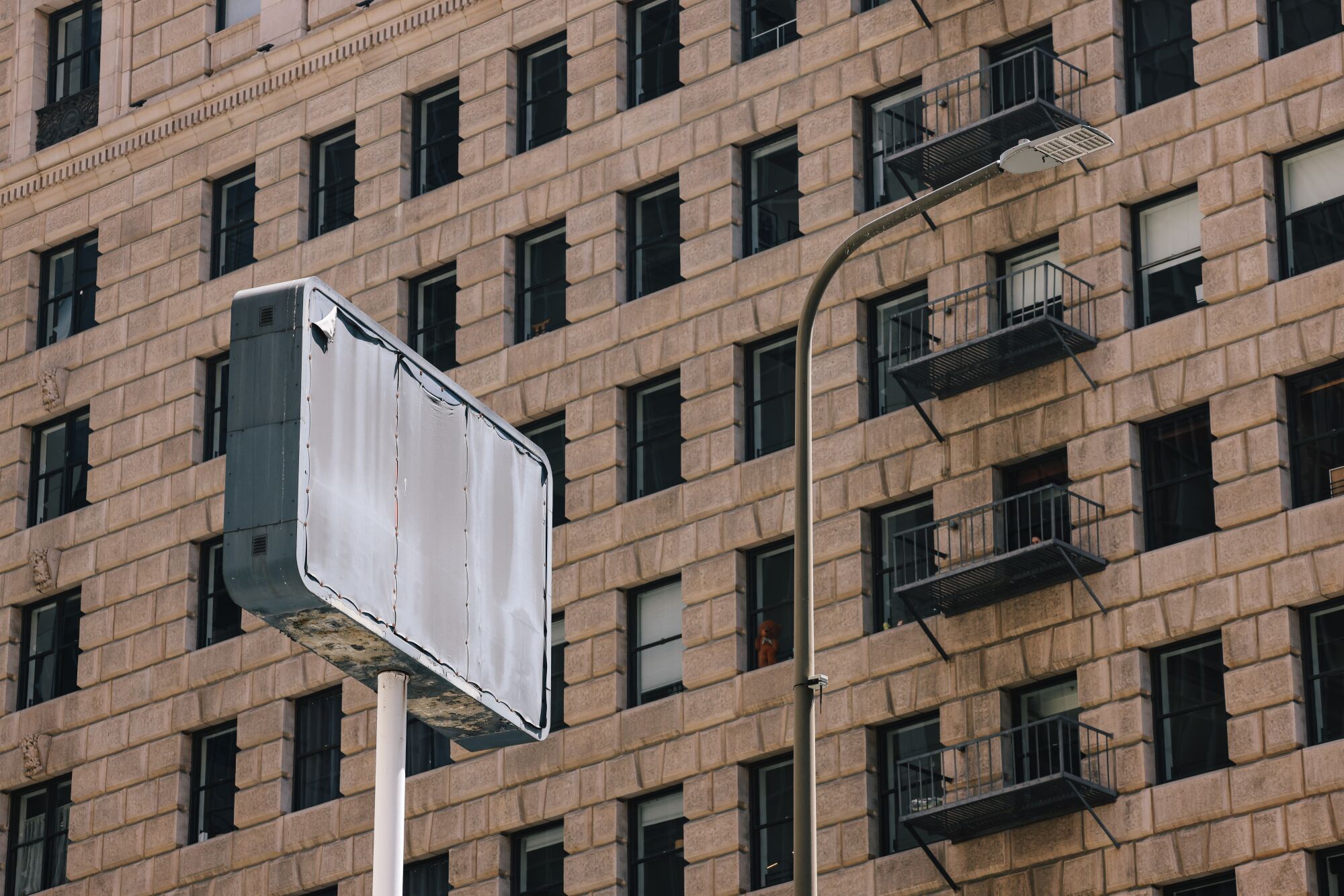 An empty sign in the financial district downtown, which is struggling to recover from the pandemic.