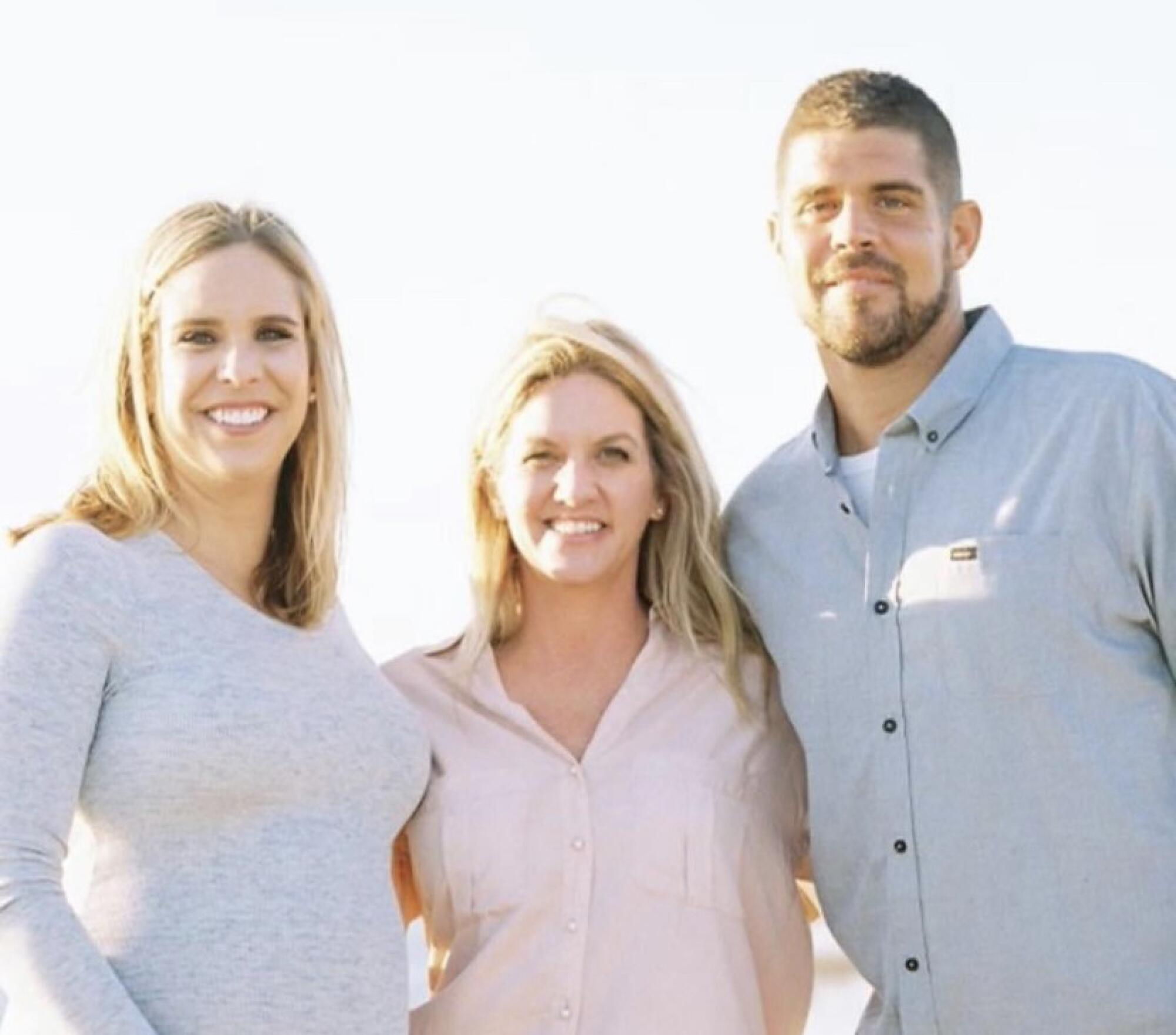 Colt Brennan in an undated family photo with sisters Chanel, left, and Carrera.