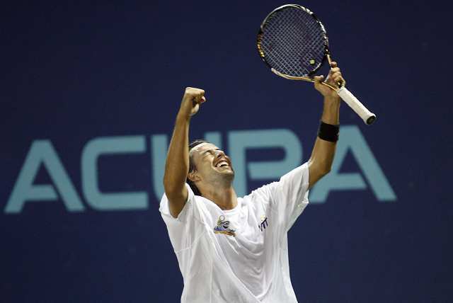The Newport Beach Breakers' Lester Cook celebrates a super tiebreaker win over St. Louis Aces' Roman Borvanov during the Breakers' season-opening victory at The Tennis Club Newport Beach.