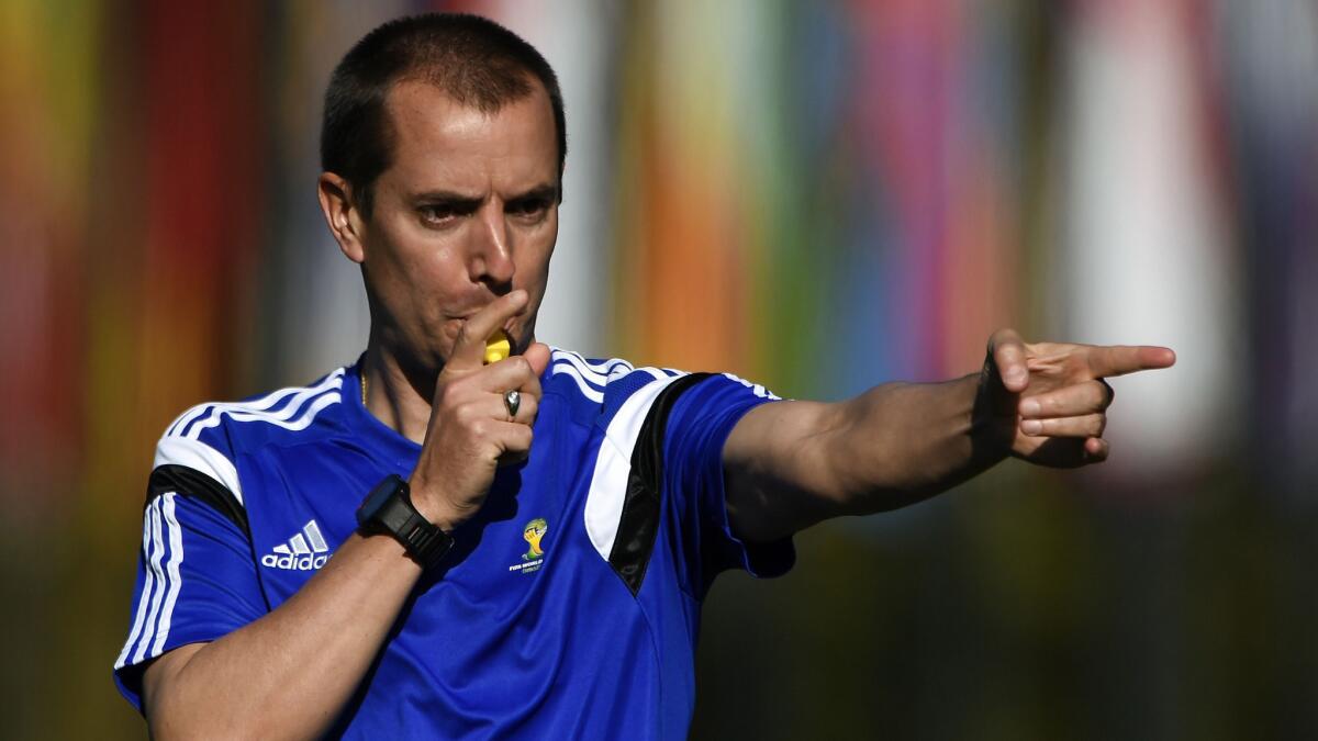 Referee Mark Geiger takes part in a seminar for World Cup referees in Zurich, Switz., in April. Geiger is set to be the first American to referee in a World Cup match since 2002.