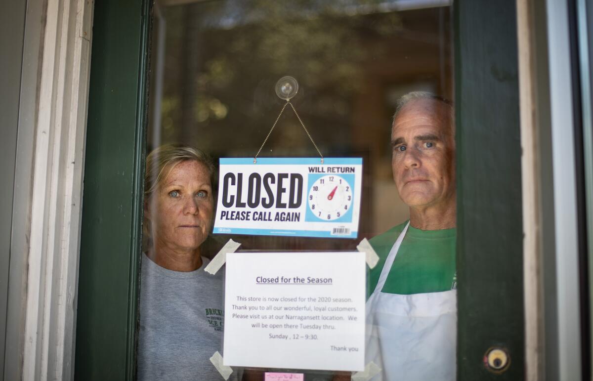 Chris and Steve Brophy, owners of Brickley's Ice Cream in Wakefield, R.I., closed their store.