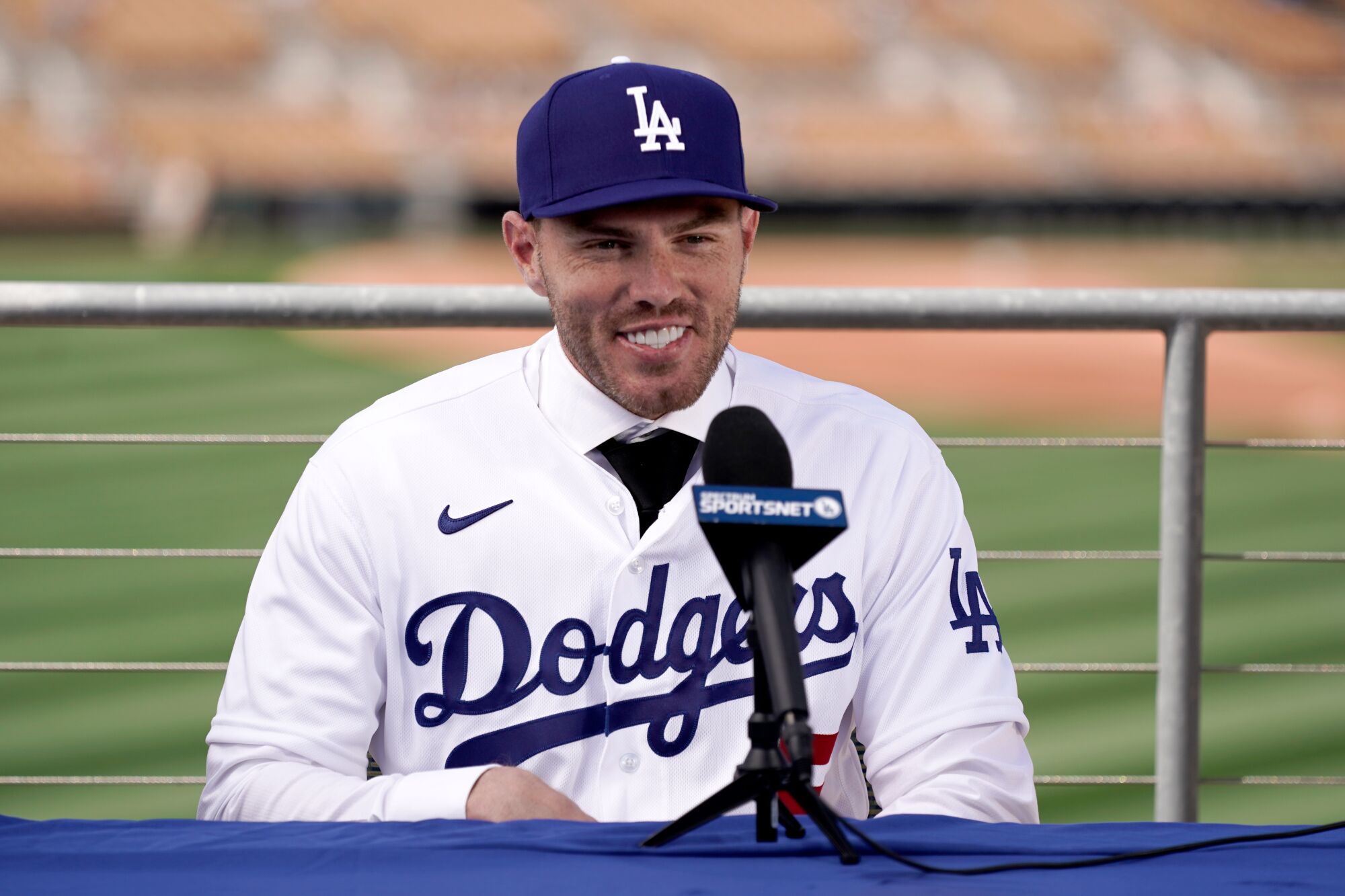 Los Angeles Dodgers' Freddie Freeman speaks during an introductory news conference.