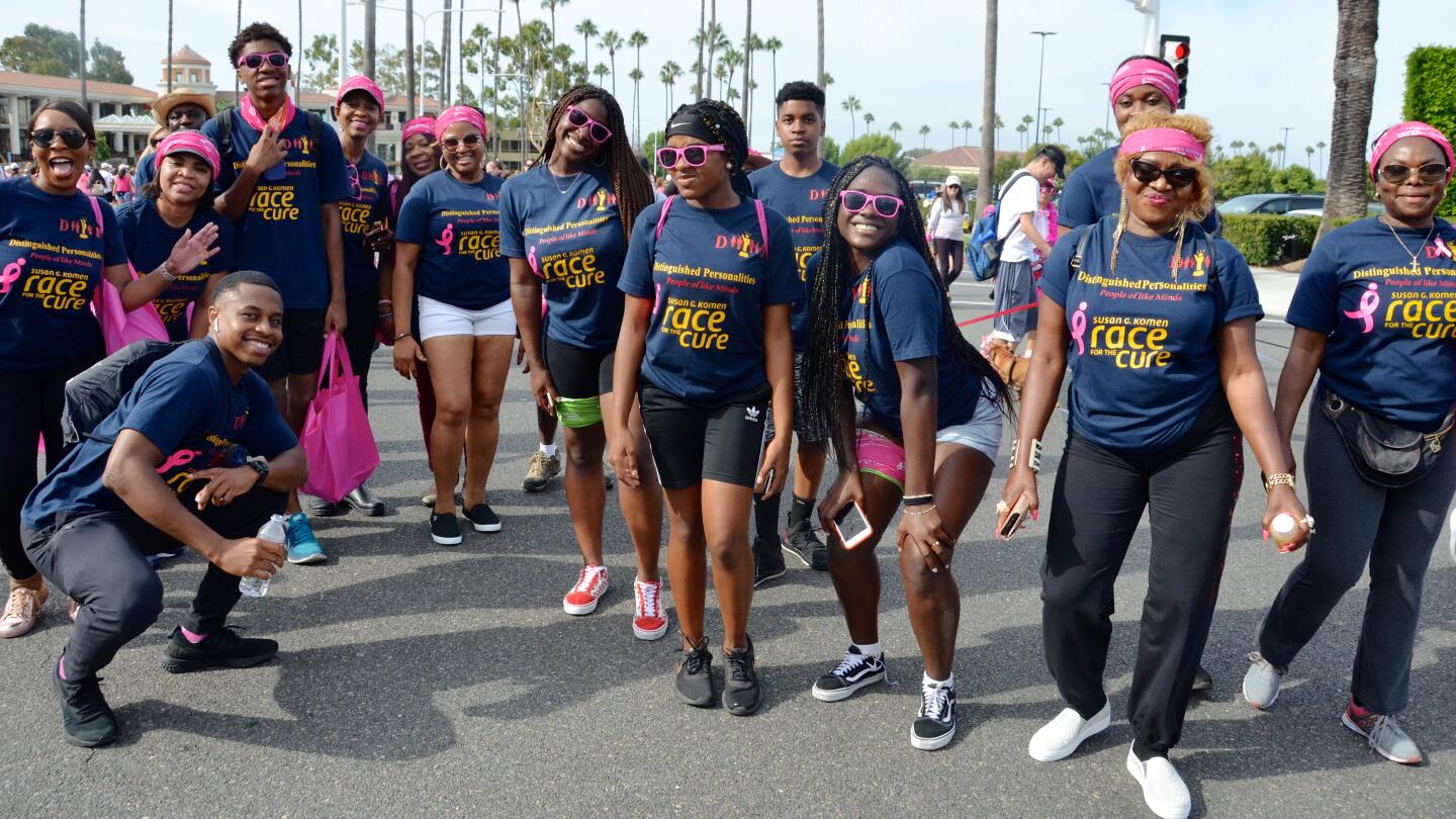 Participants gather for Susan G. Komen Orange County's More than Pink 5K walk to raise money for breast cancer research Sunday in Newport Beach.