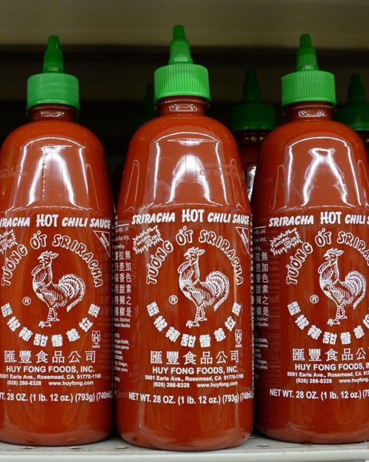 A judge has ruled that the maker of the iconic "Rooster" brand Sriracha sauce can continue its operations, at least until Nov. 22.