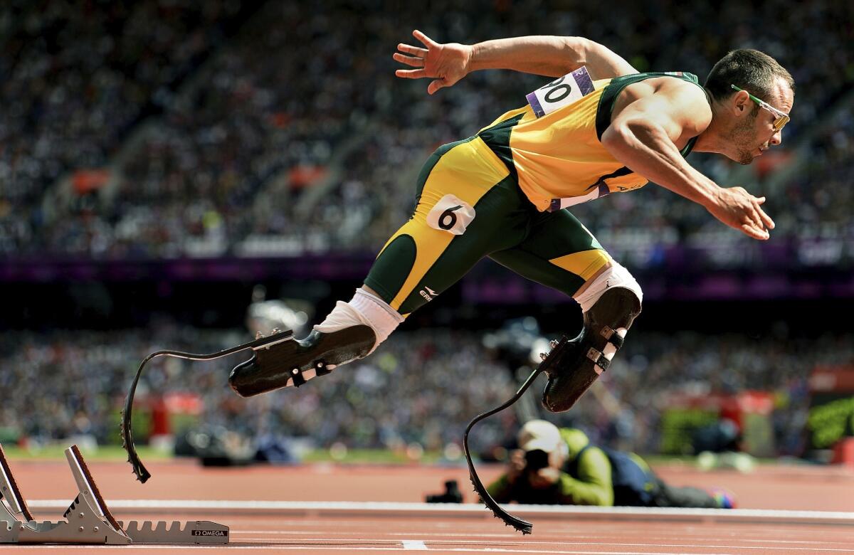 Oscar Pistorius takes off from the starting blocks during a 400-meter heat at the 2012 Olympics in London.