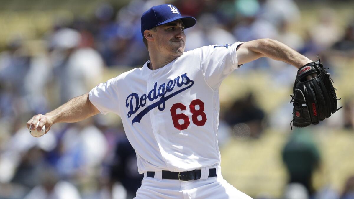 Ross Stripling of the Dodgers delivers during an eight-inning, one-run outing in a 7-1 victory over the Milwaukee Brewers.