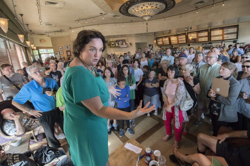 Tustin, CA - Saturday, August 3, 2019: Congresswoman Katie Porter addresses a packed room at Kean Coffee in Tustin, California on Saturday August 3, 2019. Porter is one of several California Democrats in favor of an impeachment inquiry for President Trump. (Ana Venegas / For The Times)