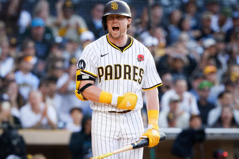 San Diego, CA - May 27: San Diego Padres second baseman Jake Cronenworth (9) reacts after walking in a run against the Miami Marlins during the seventh inning at Petco Park on Monday, May 27, 2024 in San Diego, CA. (Meg McLaughlin / The San Diego Union-Tribune)