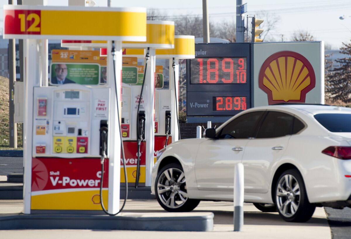 A car pulls up to a Shell Gas Station in Woodbridge, Va., on Jan. 5.