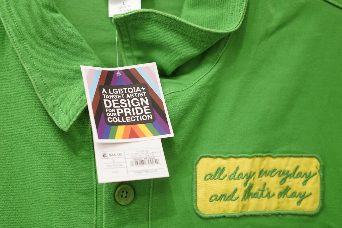 Pride Month merchandise is displayed at the front of a Target store. 