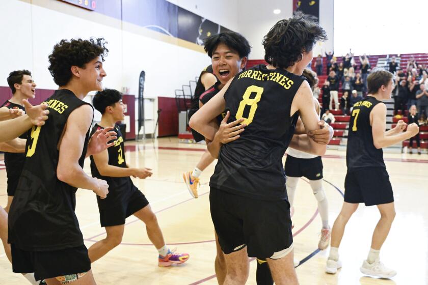 Torrey Pines' players celebrate after beating Cathedral Catholic in the CIF San Diego Section Open Division Boys Volleyball Championship May, 11, 2024 in San Diego. (Photo by Denis Poroy)