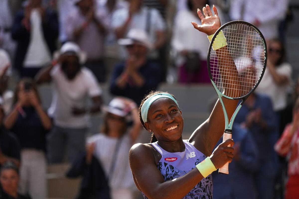 Coco Gauff of the U.S. celebrates winning her semifinal match against Italy's Martina Trevisan in two sets, 6-3, 6-1, at the French Open tennis tournament in Roland Garros stadium in Paris, France, Thursday, June 2, 2022. (AP Photo/Michel Euler)