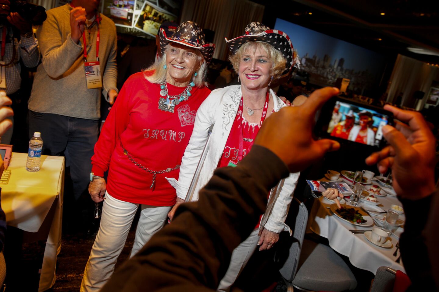 Cheryl Ann McDonald, left and Carolyn Mary Gibbs, both from Discovery Bay, stop for a photo at the start of the California Republican Convention.