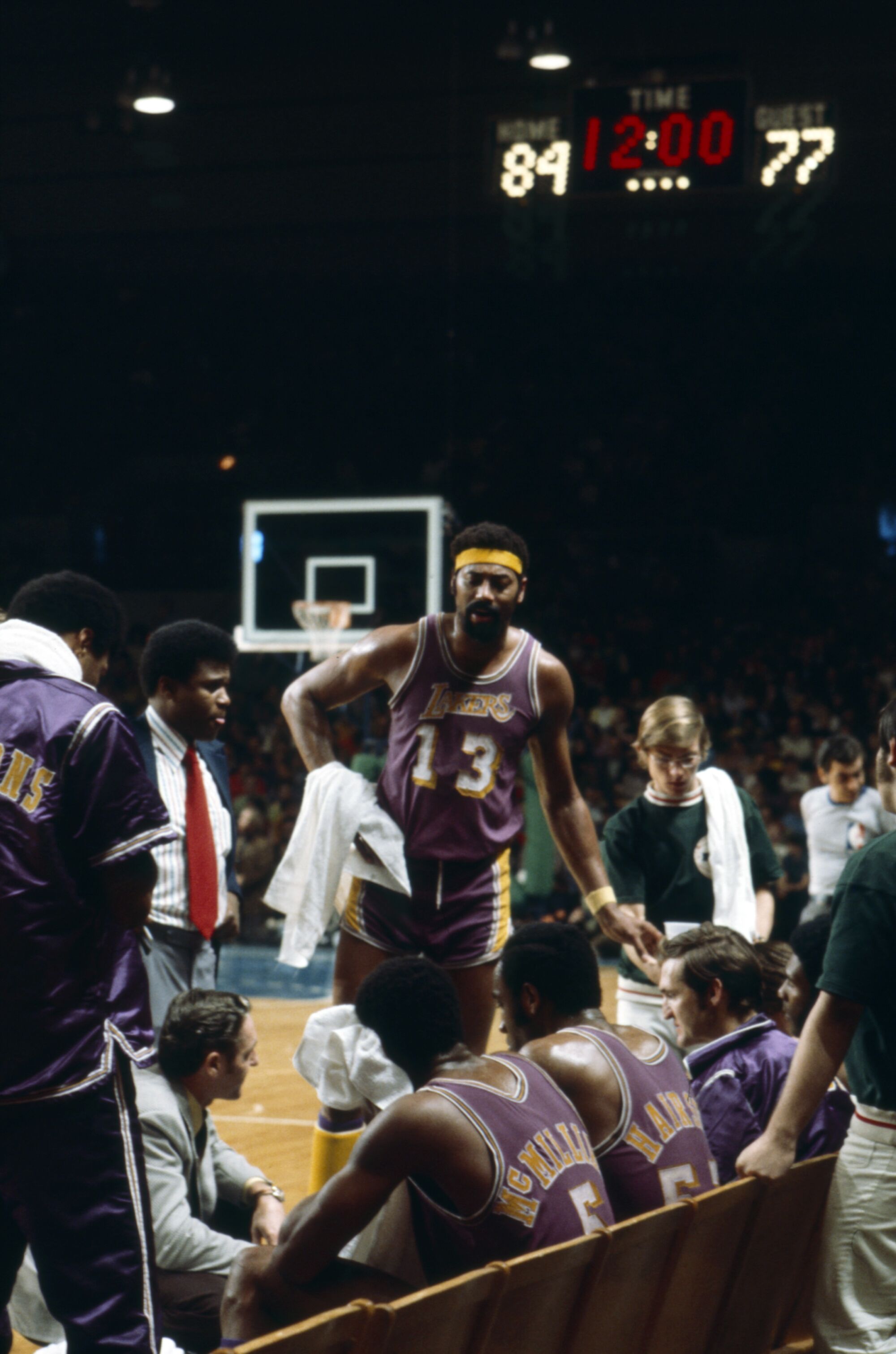 Lakers coach Bill Sharman talks to his team during a timeout on Jan. 9, 1972, in Milwaukee.