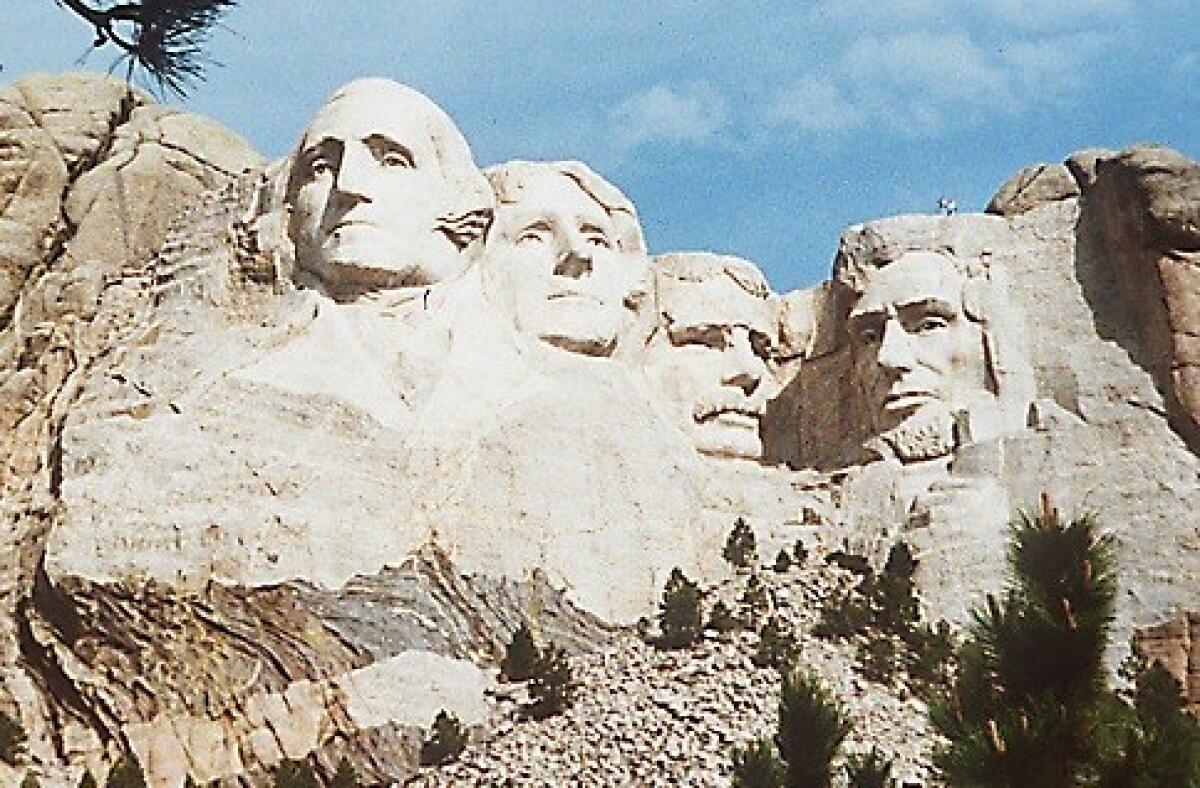 Mt. Rushmore, with sculpted images of George Washington, Thomas Jefferson, Theodore Roosevelt and Abraham Lincoln.