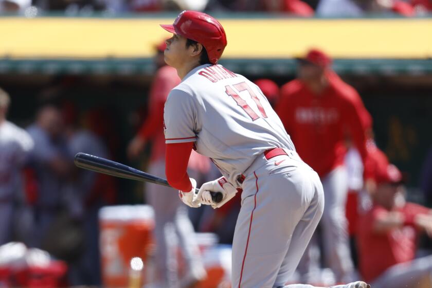 Los Angeles Angels designated hitter Shohei Ohtani (17) watches his home run during the fifth inning.