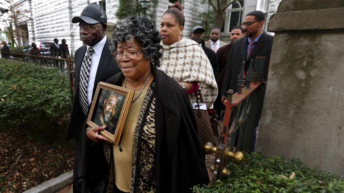 The parents of Walter Scott, Walter Scott Sr. and Judy Scott, leave the courthouse after former North Charleston police officer Michael Slager was sentenced to 20 years in prison for the 2015 shooting death of their son.