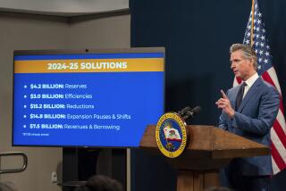 California Gov. Gavin Newsom discusses some of the ways that have been used to reduce the state's budget deficit in his revised 2024-25 state budget unveiled during a news conference in Sacramento, Calif., Friday, May 10, 2024. (AP Photo/Rich Pedroncelli)