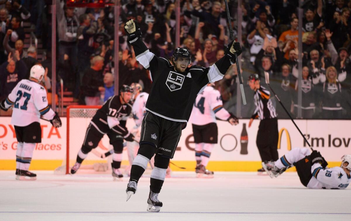 Kings center Anze Kopitar celebrates after scoring the winning goal in the Kings' 4-3 overtime victory over the San Jose Sharks on Wednesday.