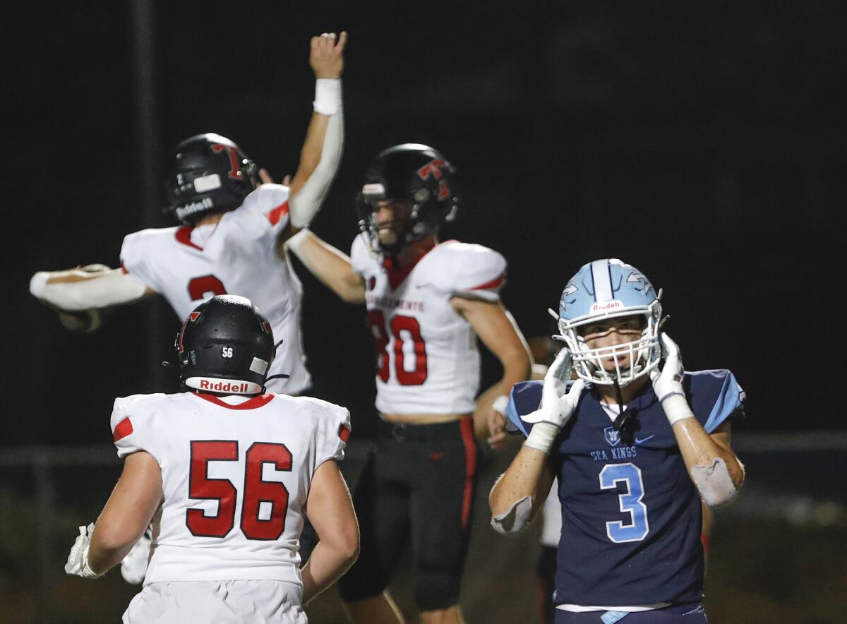 San Clemente receiver Thomas Hartanov and teammate Mason Ord (80) celebrate a touchdown during Friday's win over CdM.