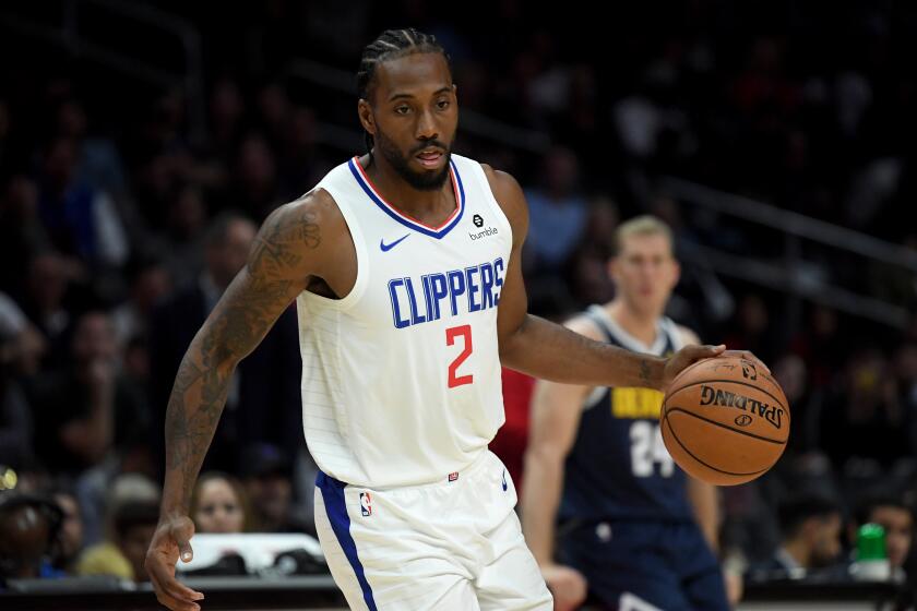 LOS ANGELES, CALIFORNIA - OCTOBER 10: Kawhi Leonard #2 of the LA Clippers dribbles during a 111-91 Denver Nuggets preseason win at Staples Center on October 10, 2019 in Los Angeles, California. (Photo by Harry How/Getty Images) ** OUTS - ELSENT, FPG, CM - OUTS * NM, PH, VA if sourced by CT, LA or MoD **