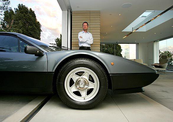 By Dan Neil Is it a garage or an art gallery with a Ferrari parked in it? Brentwood resident Holger Schubert's 1984 Ferrari 512 BBi "Boxer" makes its home in a 1,200-square-foot space that recently won Maserati and Architectural Digest's Design Driven contest for best garage. Schubert's "garage" -- hereafter I use the word with an asterisk of skepticism  is breathtaking. Beautiful. Exquisite. But where are the tools, the work benches, the girlie calendars? Schubert concedes that it isn't a typical, oil-on-the-floor garage, and he's comfortable with that. "I wanted to create a backdrop for the car as a piece of art," he says. Tag along for a tour ... Back to L.A. at Home design blog