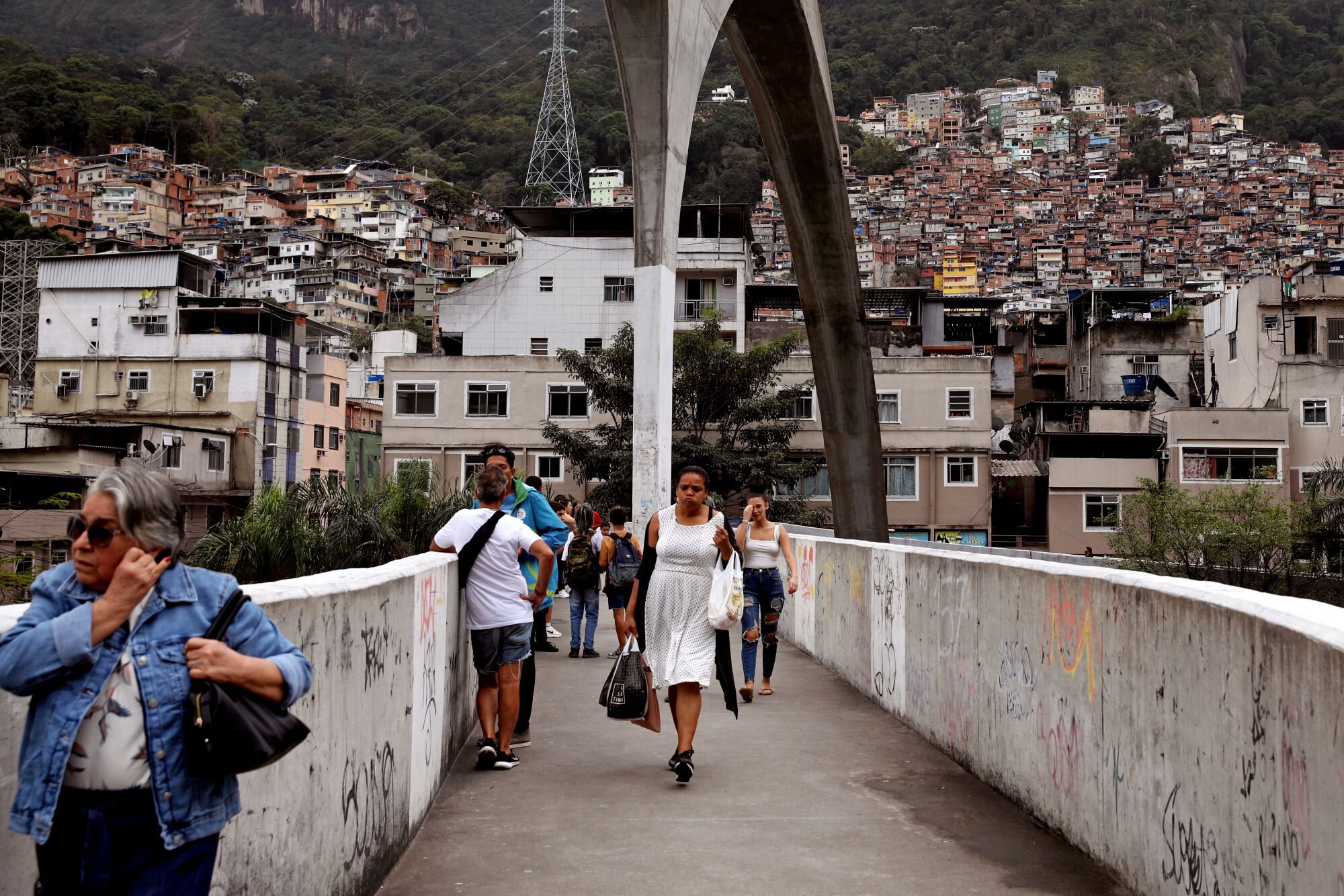 People walk along a street.