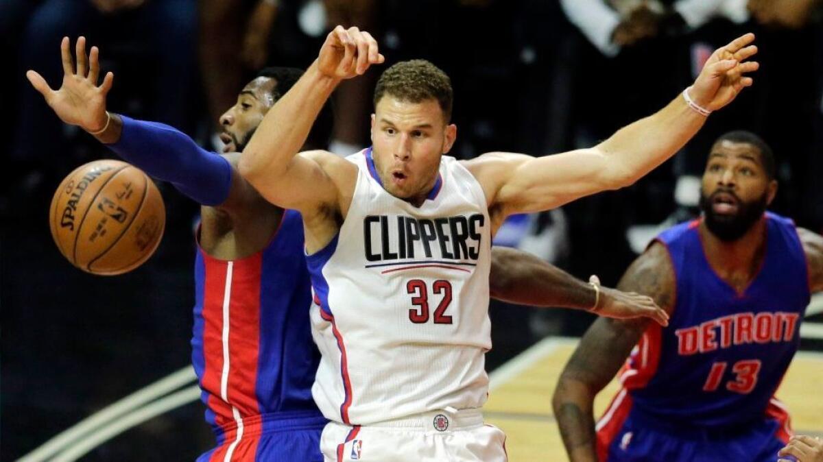 Clippers forward Blake Griffin passes the ball in front of Pistons center Andre Drummond during a game on Nov. 7.