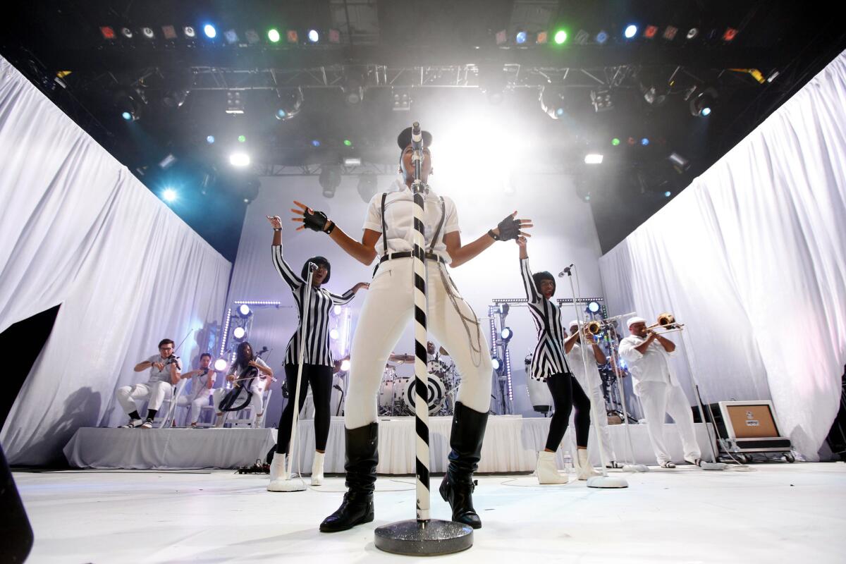 Janelle Monae, here at Club Nokia in Los Angeles on Nov. 2, has had to postpone a few shows, including one Tuesday night at the House of Blues in Anaheim.
