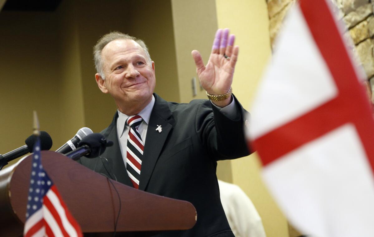 Former Alabama Chief Justice and U.S. Senate candidate Roy Moore speaks at the Vestavia Hills Public library, Saturday, Nov. 11, 2017, in Vestavia Hills, Ala. According to a Thursday, Nov. 9 Washington Post story an Alabama woman said Moore made inappropriate advances and had sexual contact with her when she was 14. Moore is denying the allegations. (AP Photo/Hal Yeager)
