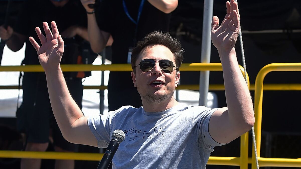 Tesla founder Elon Musk attends the 2018 SpaceX Hyperloop Pod Competition in Hawthorne. Tesla's general counsel is the latest executive to leave the electric car maker.