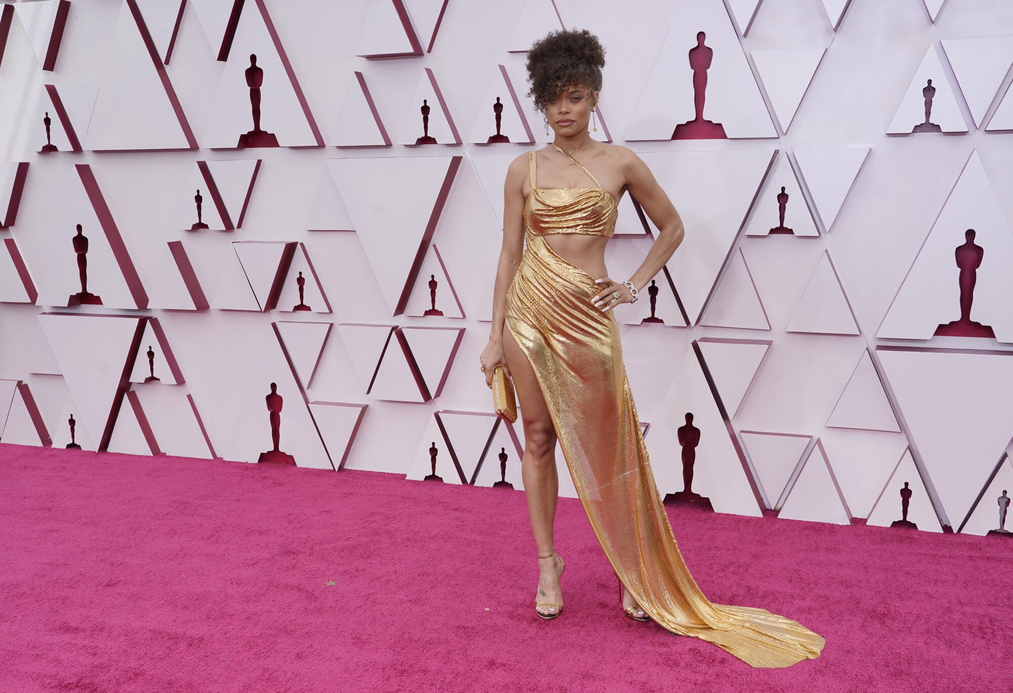 Andra Day arrives at the Oscars.
