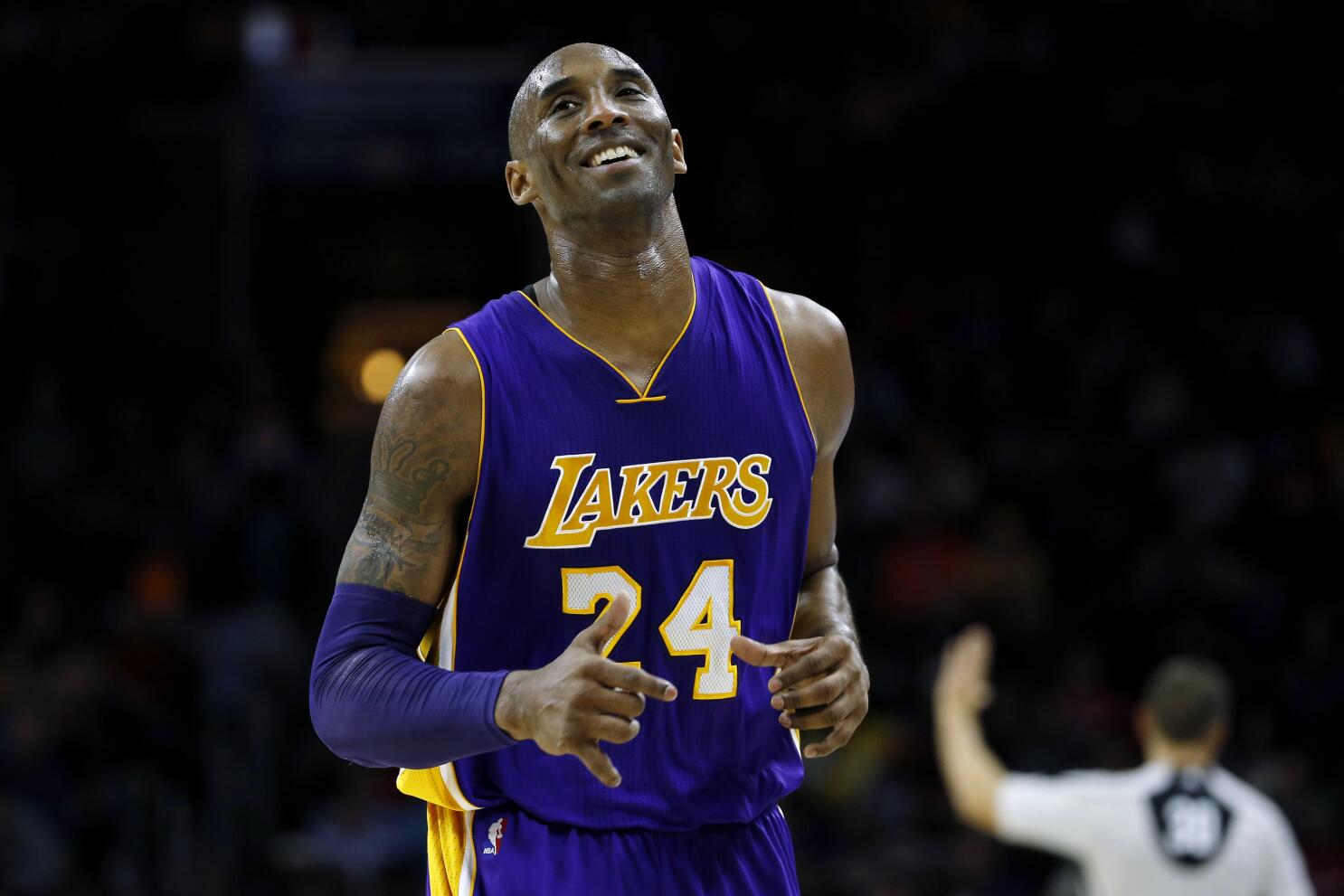 Kobe Bryant of the Los Angeles Lakers bites his jersey during a