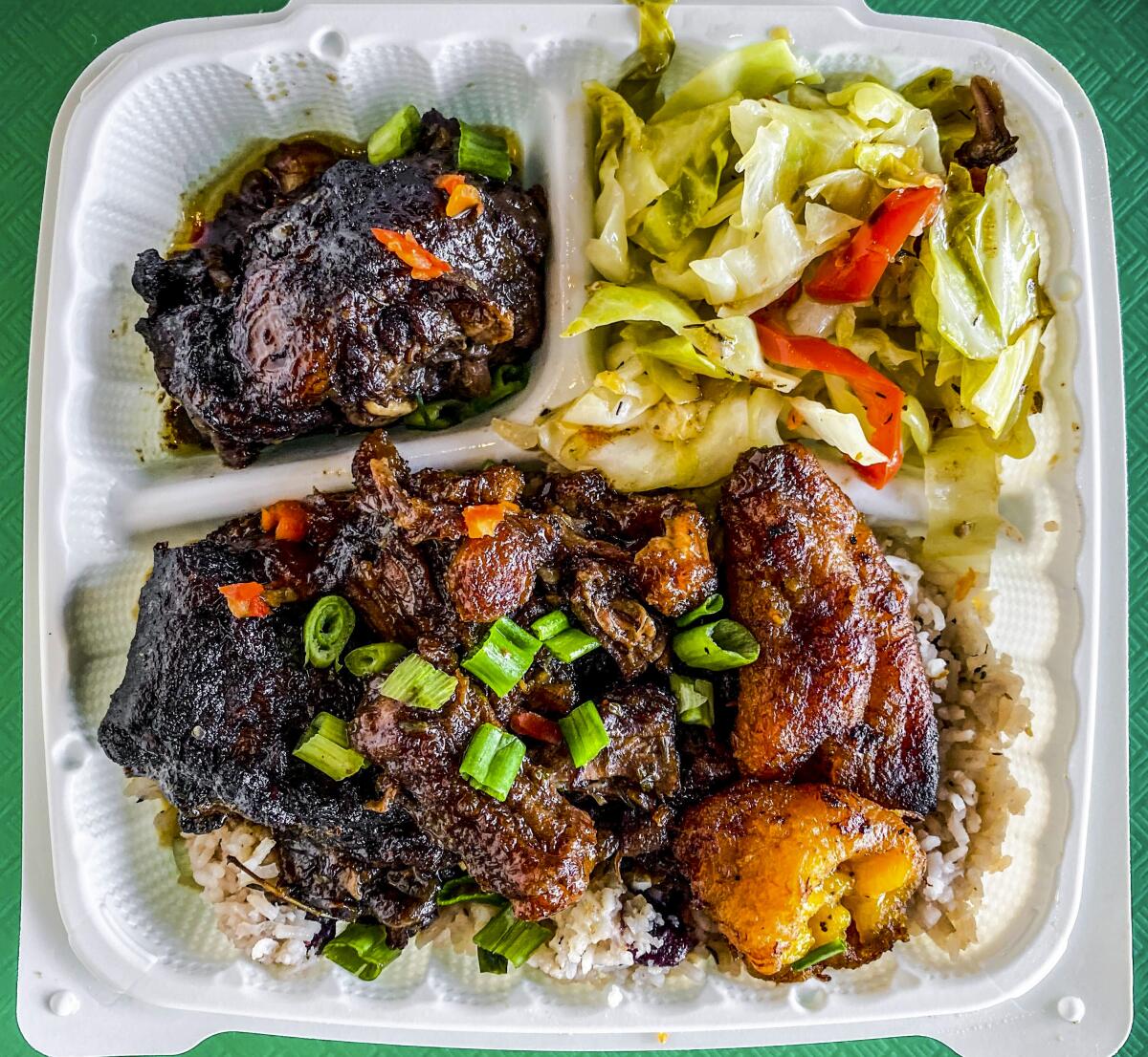 Oxtail stew in a takeout container