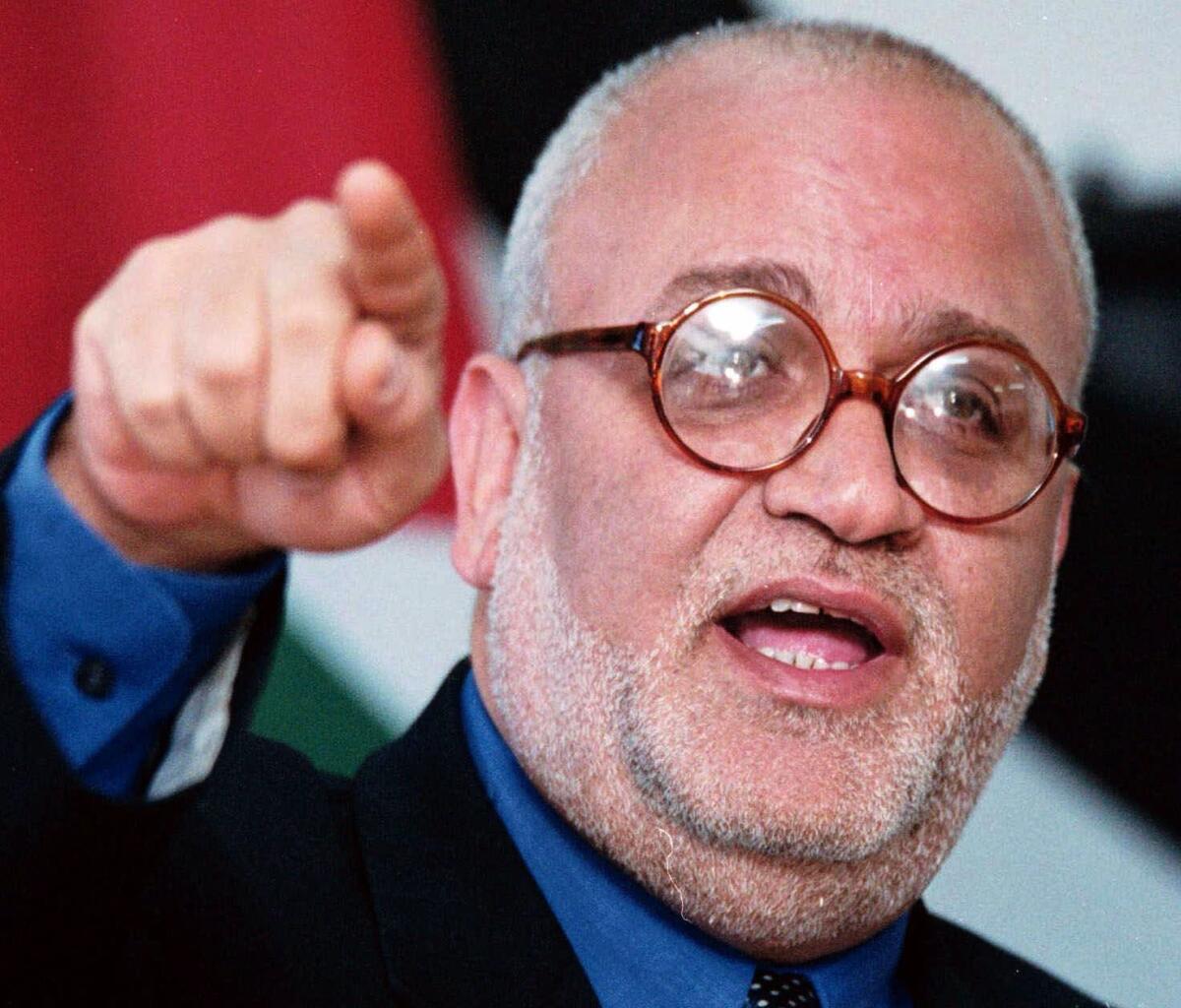 Saeb Erekat, the chief Palestinian negotiator with Israel for the last two decades, speaks at a news conference in the West Bank town of Ramallah in 2001.