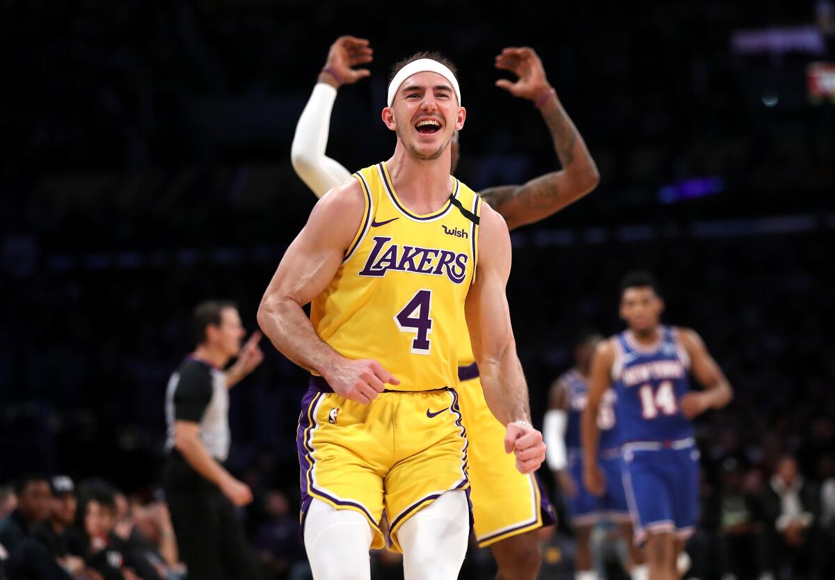 Lakers guard Alex Caruso celebrates against the New York Knicks.