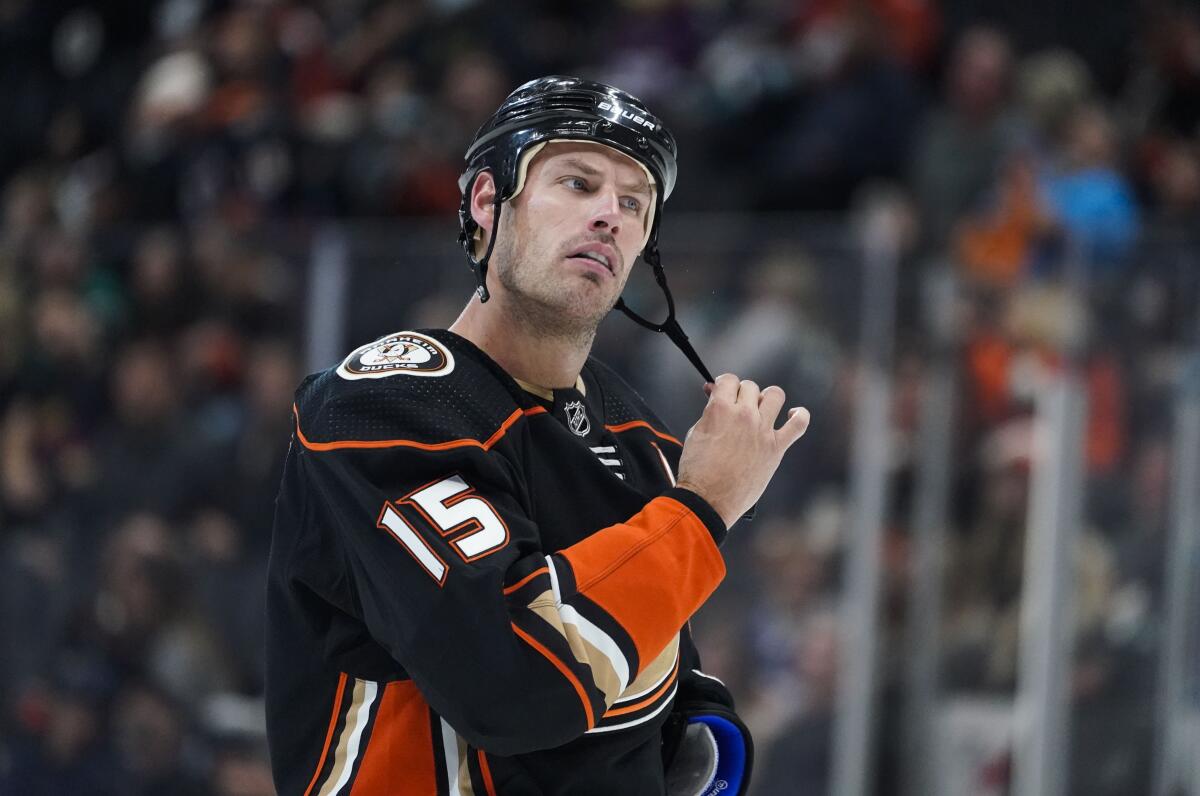 Ducks captain Ryan Getzlaf adjust his helmet during a game against the Buffalo Sabres.