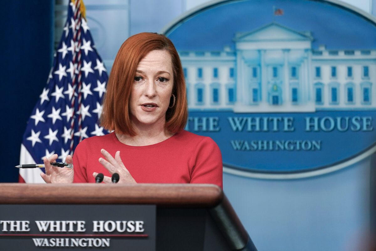 White House press secretary Jen Psaki speaks with reporters in the James Brady Press Briefing Room at the White House in Washington, Friday, Feb. 4, 2022. (AP Photo/Carolyn Kaster)