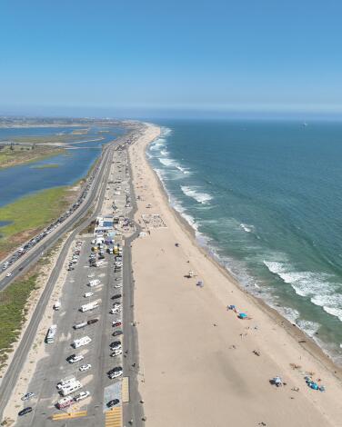 Huntington Beach, CA - June 07: Beach goers enjoy nice weather at Bolsa Chica State Beach in Huntington Beach Friday, June 7, 2024. (Allen J. Schaben / Los Angeles Times)