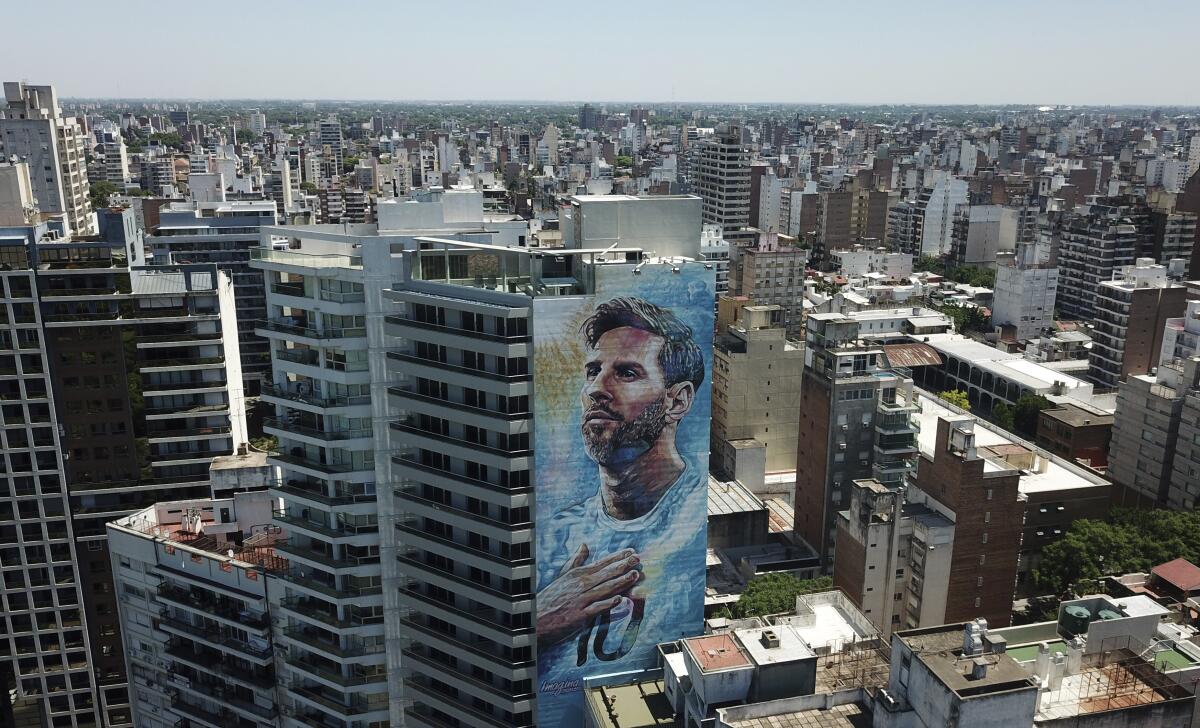 A mural of soccer player Lionel Messi covers the side of a building in Rosario, Argentina.