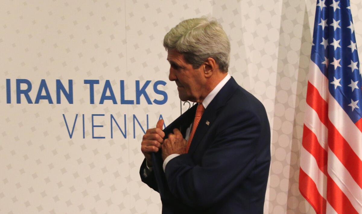 Secretary of State John F. Kerry leaves a news conference in Vienna on July 15 after closed-door nuclear talks on Iran's nuclear program.