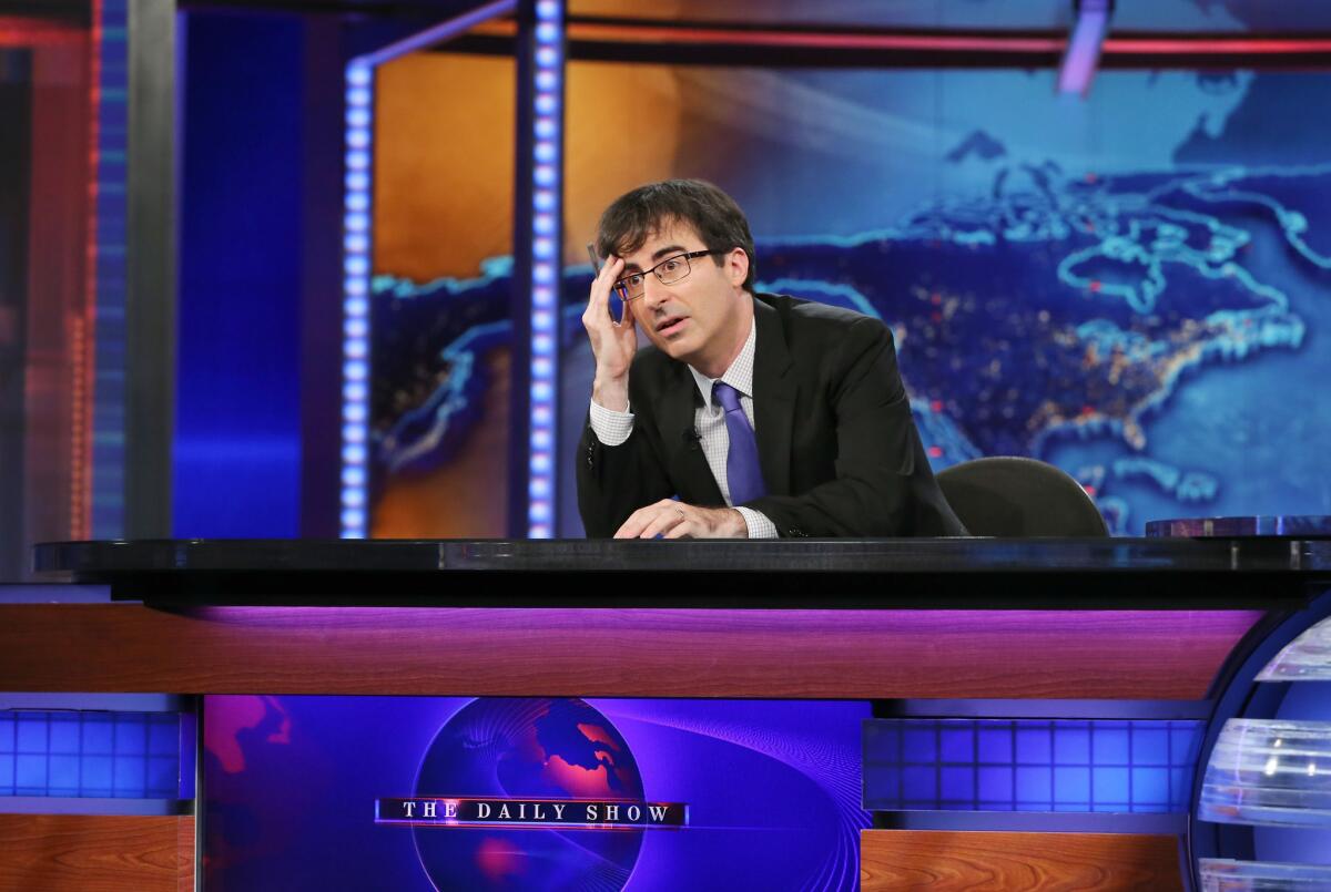 Comedy Central now has an opening in its late-night lineup, but John Oliver -- shown filling in for Jon Stewart on "The Daily Show" last summer -- left the network last year to headline a new show on HBO.