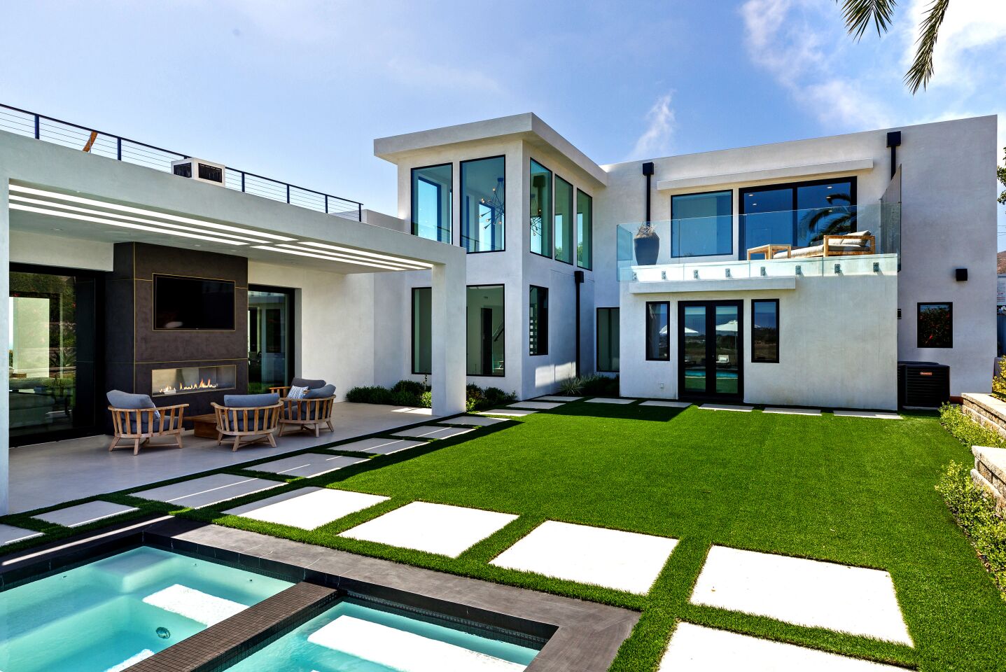 The newly-finished home near Zuma Beach is geared for indoor-outdoor living with pocketing walls, wrap-around terraces, balconies and a rooftop deck.