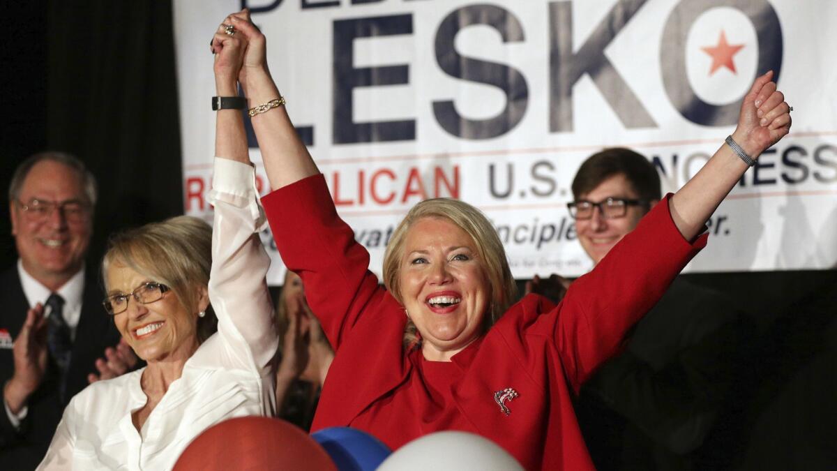 Republican congressional candidate Debbie Lesko, right, celebrates her win with former Arizona Gov. Jan Brewer on April 24.