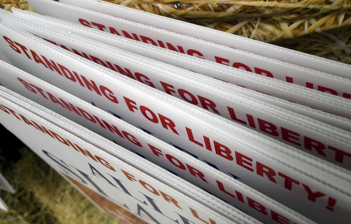 A stack of Republican political signs 