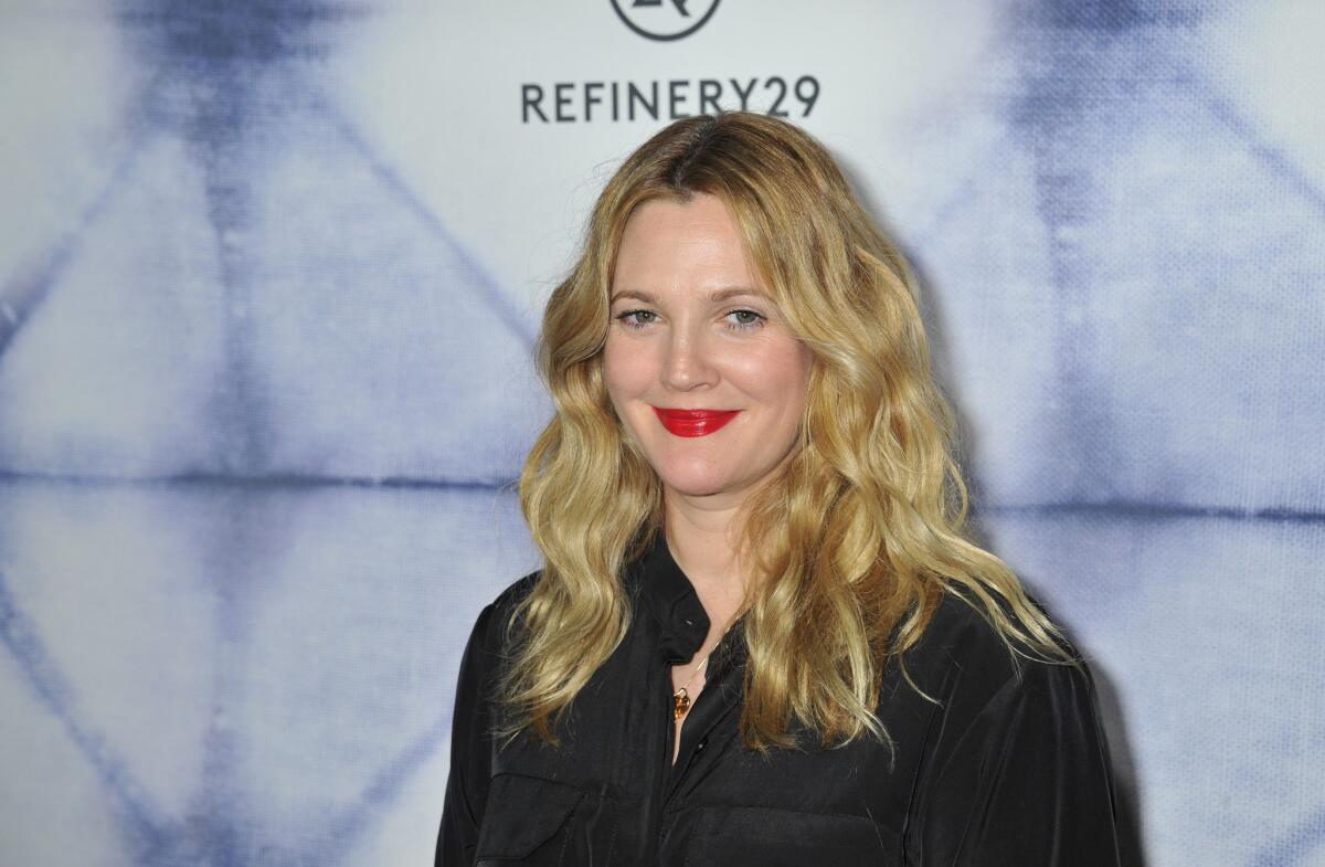 Drew Barrymore arrives at the Refinery29 Holiday Party at Sunset Towers in Los Angeles on Dec. 10