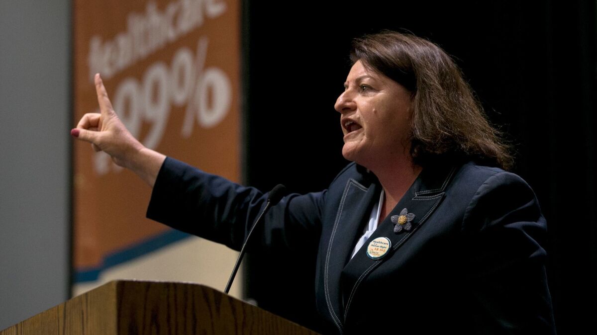 State Sen. Toni Atkins, D-San Diego, calls for passage of a single-payer health care measures at a rally April 26, 2017, in Sacramento, Calif.